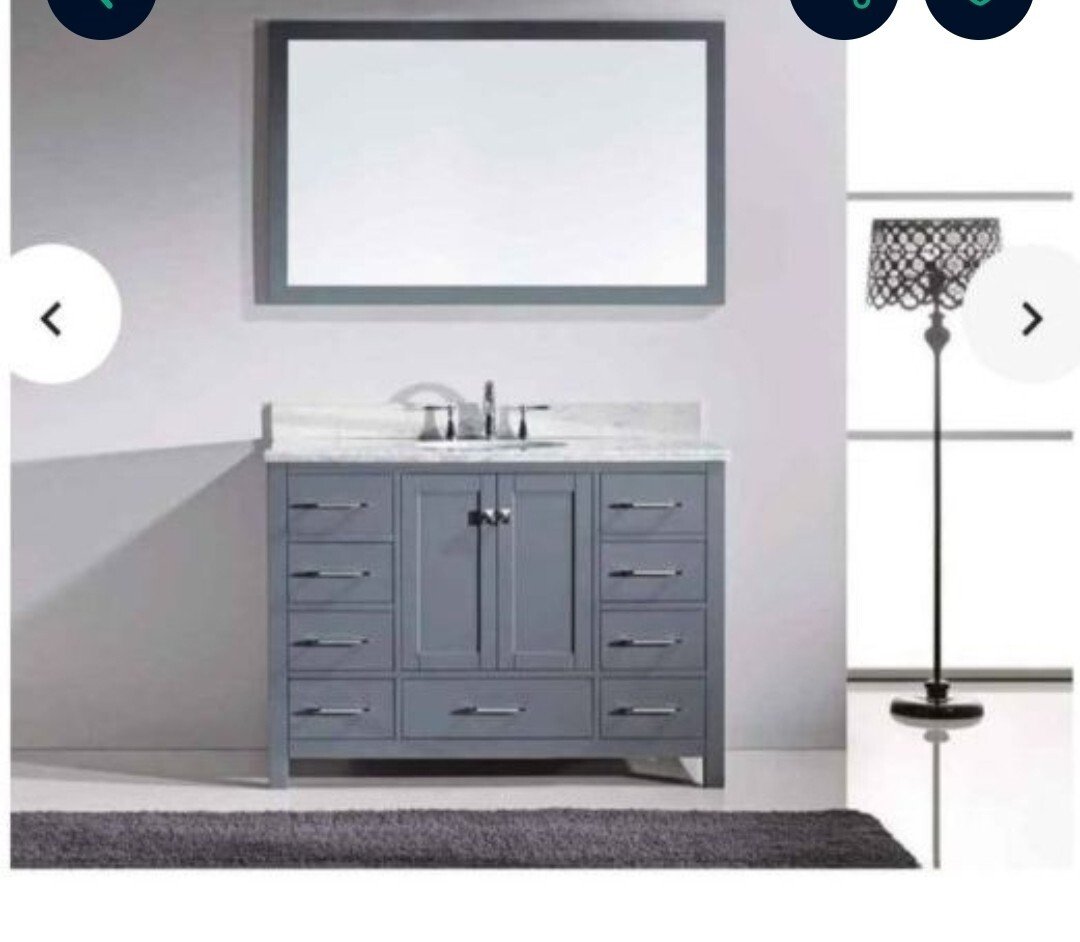 Caroline Avenue 45.7 in. W x 31.5 in. H Framed Mirror in Gray Finish.